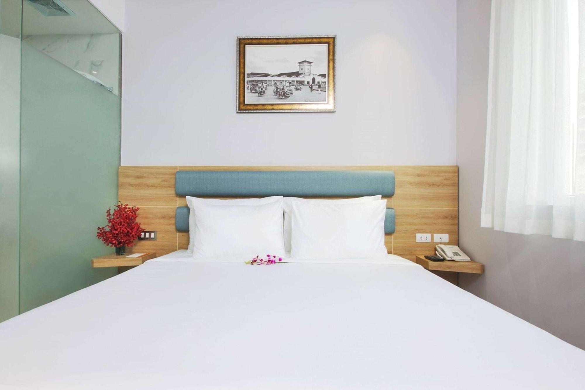 Ramada Encore By Wyndham Saigon D1 - Formerly M Boutique Hotel Saigon Ho-Chi-Minh-Stadt Exterior foto