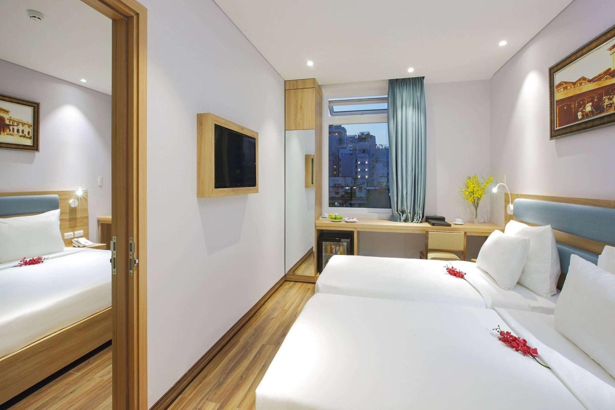 Ramada Encore By Wyndham Saigon D1 - Formerly M Boutique Hotel Saigon Ho-Chi-Minh-Stadt Exterior foto