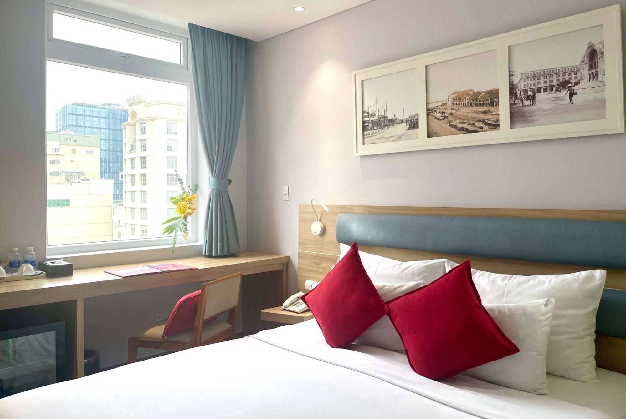 Ramada Encore By Wyndham Saigon D1 - Formerly M Boutique Hotel Saigon Ho-Chi-Minh-Stadt Exterior foto